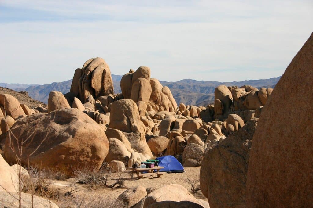 a wide shot photo of a campsite located at Joshua Tree. As covered in the best campsites in Joshua Tree article.