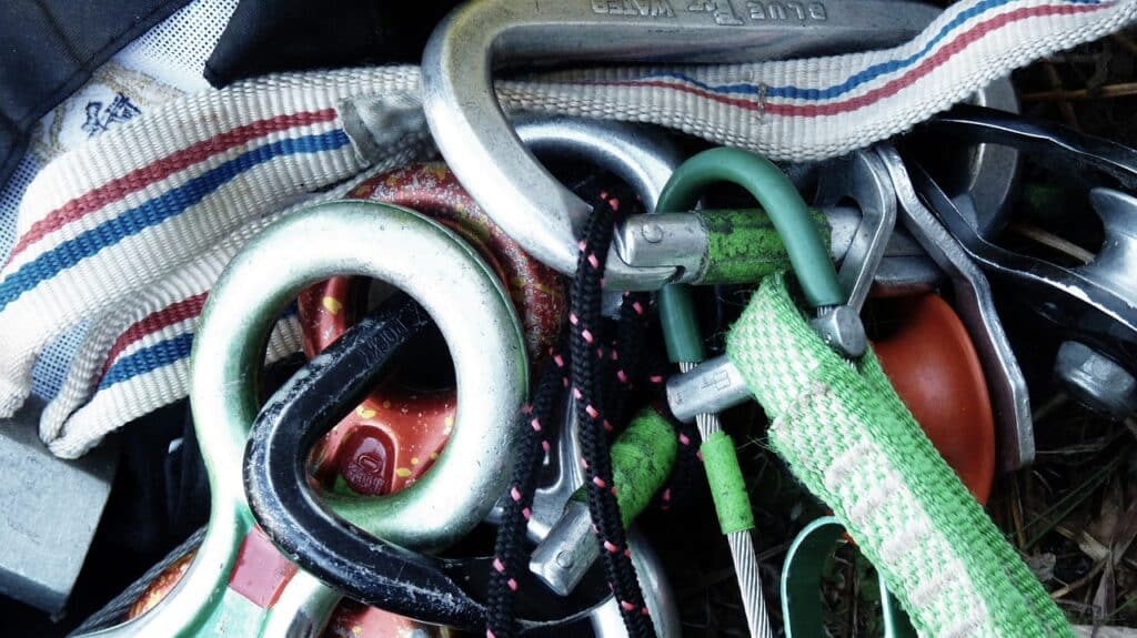 zoomed in photo of various ice climbing protection gear