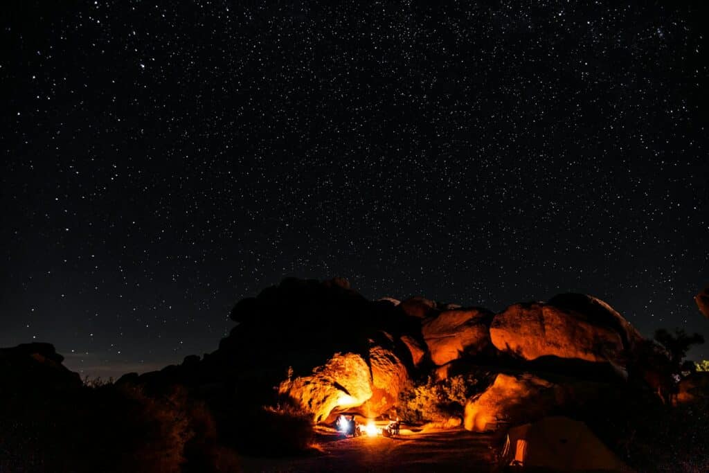 night time photo of a best campsites in joshua tree, displaying millions of stars highlighting one of the best features of camping at Joshua Tree.